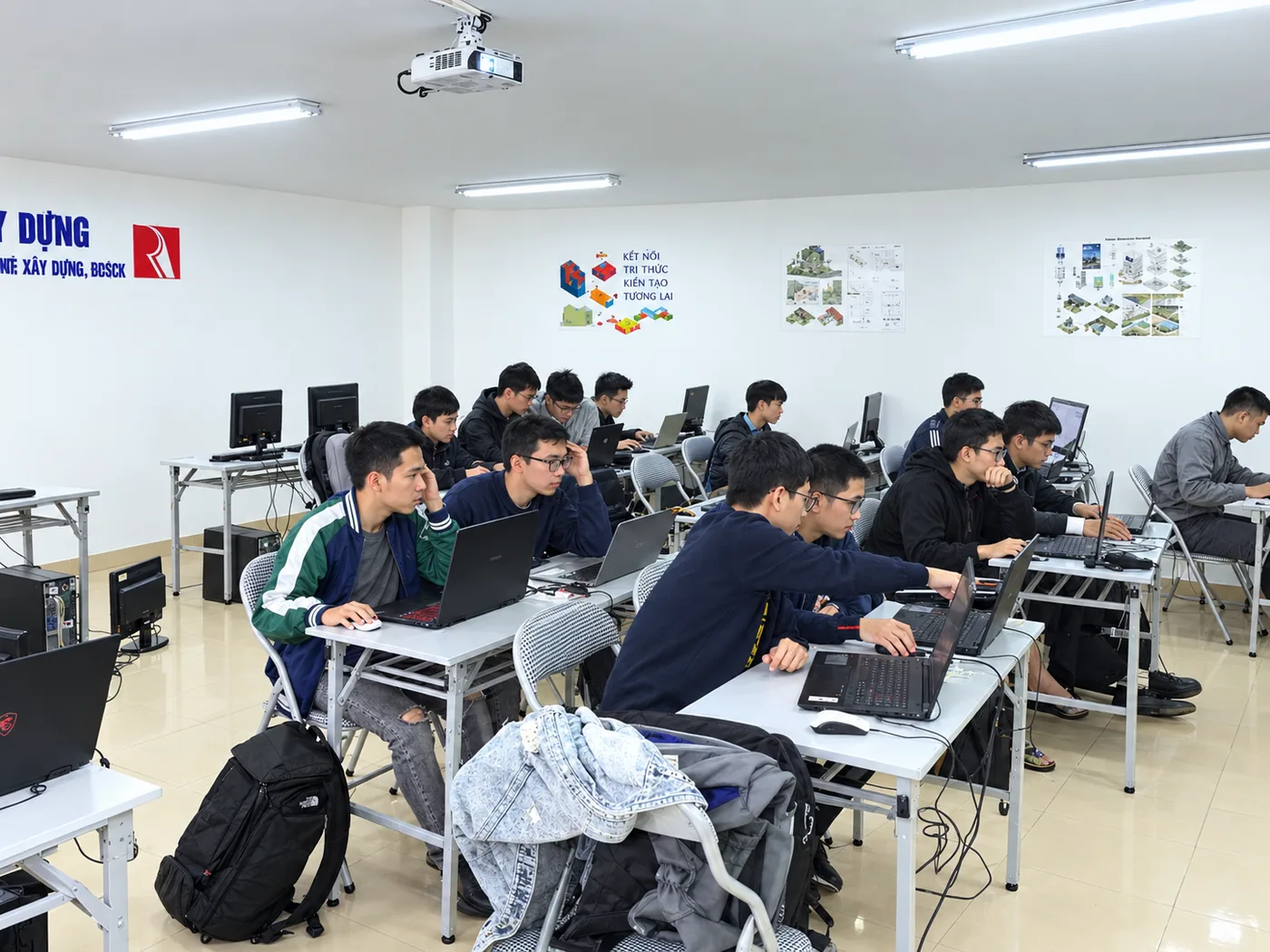 Revit Structure students working on laptops in an RDSIC classroom