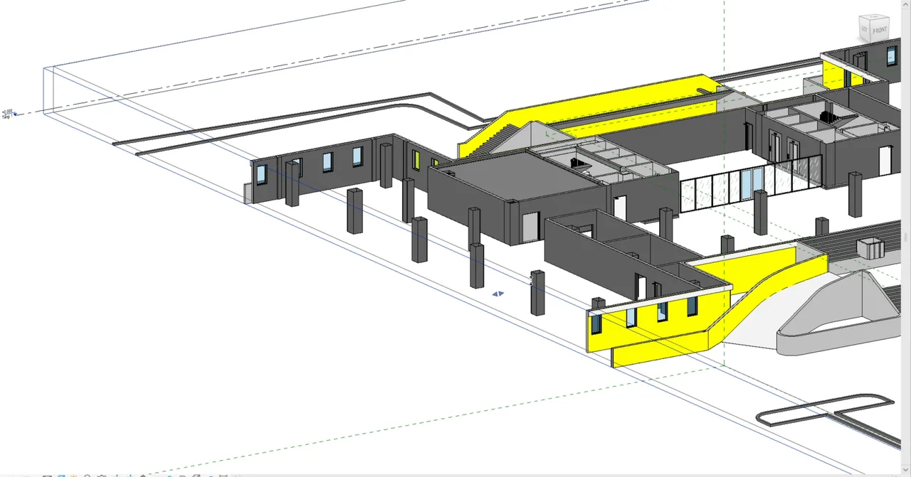 Revit 3D model with finish wall layers built by RDS VNCC, shown in yellow along the structural walls